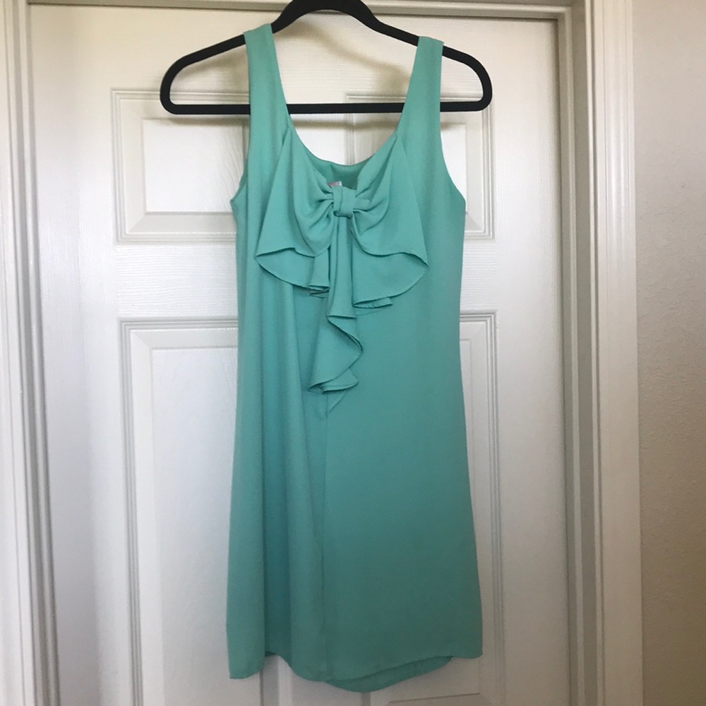 Blue mini dress with bow on back